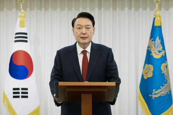 President Yoon Suk Yeol gives a public address from the presidential residence in Yongsan District, central Seoul, after the passage of the impeachment motion aginst him on Saturday. [PRESIDENTIAL OFFICE]