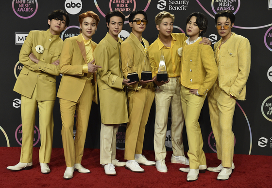 Boy band BTS at the 2021 American Music Awards in November [AP/YONHAP]