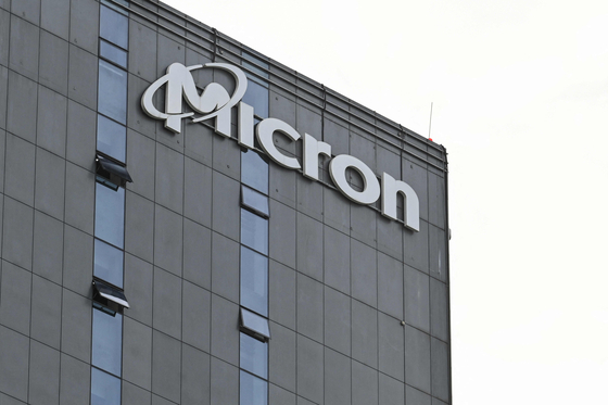 A view of a building where the facilities of US semiconductor giant Micron are located in Shanghai, China, on May 22, 2023 [AFP/YONHAP]