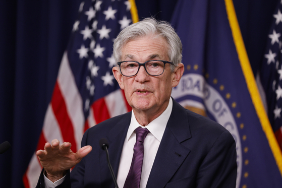U.S. Federal Reserve Chairman Jerome Powell speaks during a news conference in Washington on Dec. 18 following the Federal Open Market Committee (FOMC) meeting. In Korea, the won-dollar exchange rate soared above the 1,450 won per dollar mark for the first time in 15 years and nine months following the FOMC meeting. [EPA/YONHAP] 