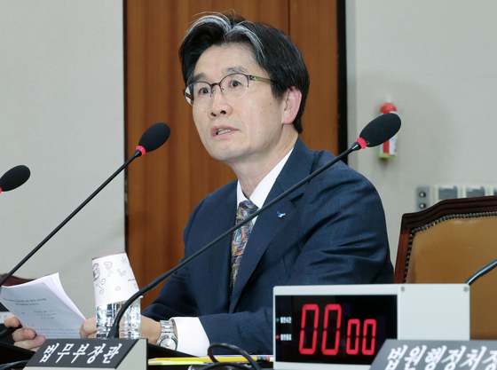 Oh Dong-woon, head of the Corruption Investigation Office for High-ranking Officials, speaks at the National Assembly complex in Yeouido, western Seoul on Dec. 9. [KIM SEONG-RYONG] 