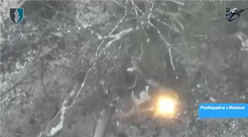 A screenshot image of a video released by the Ukrainian Special Operation Forces, seemingly depicting North Korean soldiers being attacked by drones in the Kursk region in Russia. [SCREEN CAPTURE]
