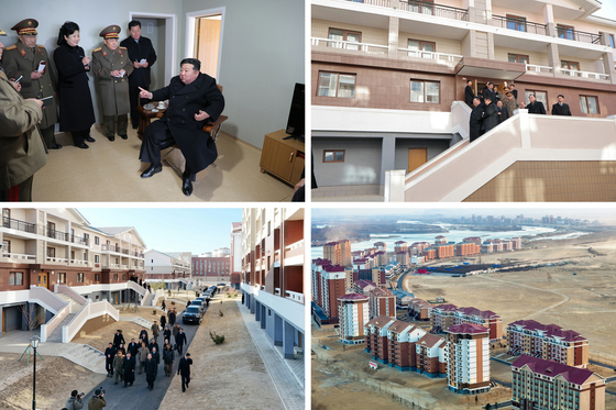 North Korean leader Kim Jong-un attends a ceremony held on Dec. 21 to mark the completion of rebuilt houses destroyed by floods in North Phyongan in July, in this photo released by the North's official Korean Central News Agency the next day. [NEWS1]