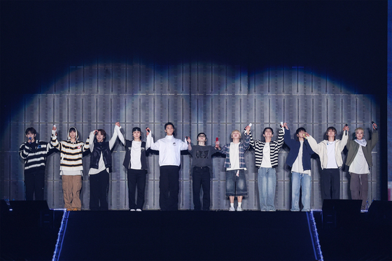 Boy band Seventeen during its Fukuoka PayPay Dome performance, held on Dec. 19, 21 and 22 in Japan as part of its ″Right Here″ world tour. [PLEDIS ENTERTAINMENT]