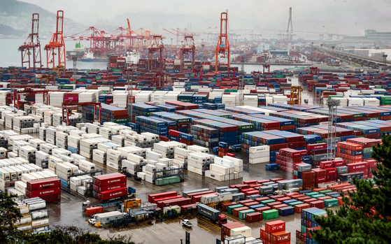 Shipping containers are stacked at a container yard in the port city of Busan on Nov. 1, 2024. [YONHAP]
