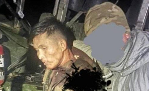 The photo from Telegram showing a suspected North Korean soldier, reportedly captured by the Ukrainian military. [YONHAP] 