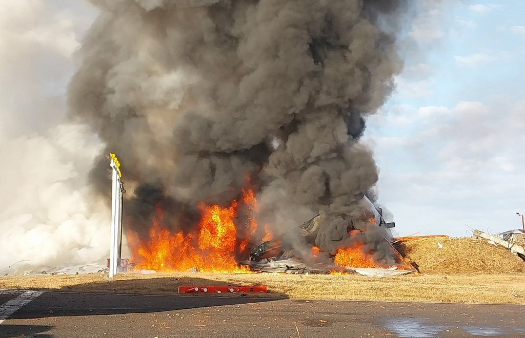 A Jeju Air plane is on fire after it veers off the runway at Muan International Airport in South Jeolla on Dec. 29. [NEWS1] 