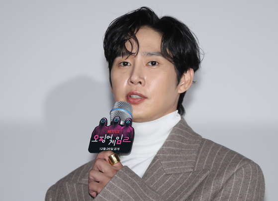 Actor Park Sung-hoon speaks during a press conference for the second season of Netflix's ″Squid Game″ (2021-) held in Jung District, central Seoul, on Dec. 9. [YONHAP]