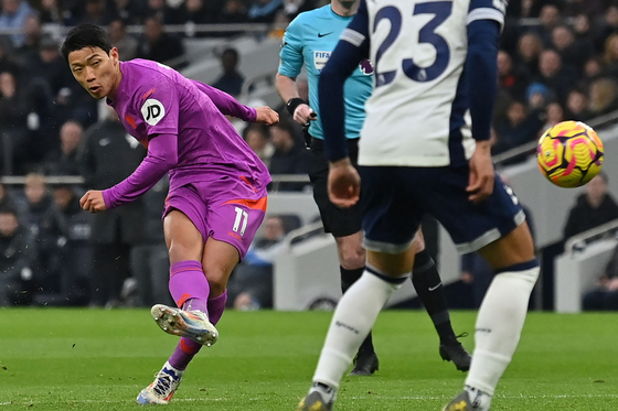 Wolverhampton Wanderers forward Hwang Hee-chan shoots during a Premier League match against Tottenham Hotspur at Tottenham Hotspur Stadium in London on Dec. 29. [AFP/YONHAP] 
