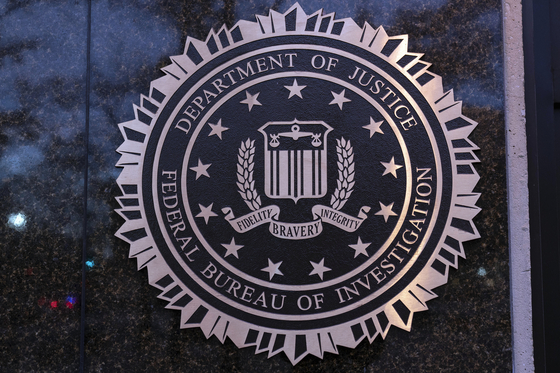 The seal of the Federal Bureau of Investigation (FBI) is seen at the headquarters of the FBI in Washington on Dec. 7, 2024. [AP/YONHAP]