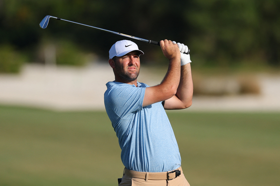 Scottie Scheffler plays a shot on the 13th hole during the final round of the Hero World Challenge 2024 at Albany Golf Course on Dec. 8, 2024 in Nassau, Bahamas. [AFP/YONHAP]