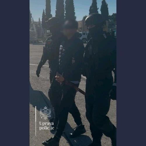 Kwon Do-hyung, center, co-founder of Terraform Labs, is handed over to U.S. authorities in Montenegro on Dec. 31. [MONTENEGRIN POLICE AGENCY]