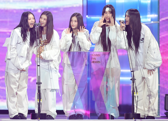 Girl group NewJeans speaks after winning the Best Digital Song at the 39th Golden Disc Awards held at the Mizuho PayPay Dome in Fukuoka, Japan, on Jan. 4. The group members did not mention their group name ″NewJeans″ during the speech. [GOLDEN DISC AWARDS ORGANIZING COMMITTEE]