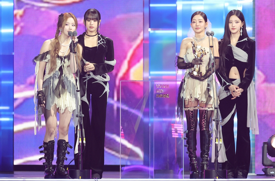 Girl group Kiss of Life delivers a speech after winning the Next Generation award at the 39th Golden Disc Awards held at the Mizuho PayPay Dome in Fukuoka, Japan, on Jan. 4. [GOLDEN DISC AWARDS ORGANIZING COMMITTEE]