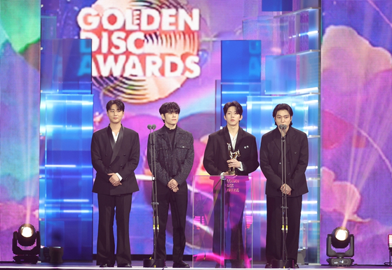 Boy band DAY6 speaks after winning the Best Digital Song award at the 39th Golden Disc Awards held at Mizuho PayPay Dome in Fukuoka, Japan, on Jan. 4. [GOLDEN DISC AWARDS ORGANIZING COMMITTEE]