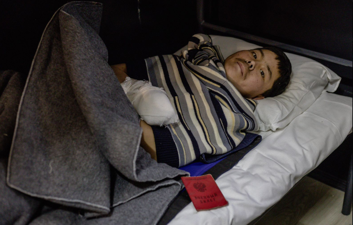 A wounded soldier, suspected to be North Korean and captured by Ukrainian forces, is seen in this photo posted on Ukrainian President Volodymyr Zelensky's Telegram on Jan. 11. [SCREEN CAPTURE]
