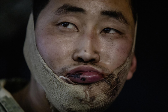A North Korean soldier captured by the Ukrainian military in the Kursk region of Russia is seen in this video released on Saturday. [YONHAP] 