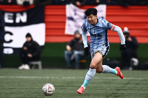 Tottenham Hotspur Son Heung-min runs with the ball during the FA Cup match against Tamworth at the Lamb Ground in England on Jan. 12. [AFP/YONHAP] 
