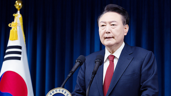 Impeached President Yoon Suk Yeol delivers a public address at the presidential office in Yongsan District, central Seoul, on Dec. 7, 2024. [PRESIDENTIAL OFFICE] 