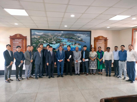 This photo, captured from the social media of Hindustan Shipyard, shows a meeting between the Indian company and a delegation from Hanwha Ocean in India on Jan. 13. [YONHAP]