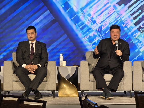 Celltrion Chairman Seo Jung-jin, right, speaks during the 43rd J.P. Morgan Healthcare Conference on Jan. 14 at the Westin St. Francis Hotel, with his son and Celltrion co-CEO Seo Jin-seok, left, on stage.[CELLTRION]