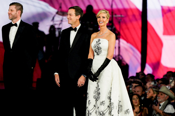 Ivanka Trump, first from right, and her husband Jared Kushner and Eric Trump react as President Donald Trump speaks at the Liberty Ball on Inauguration Day of his second presidential term in Washington, Jan. 20. [REUTERS/YONHAP]