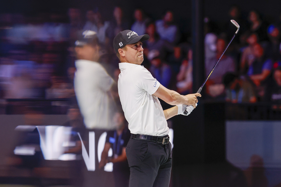 Justin Thomas of Atlanta Drive GC plays a shot on the sixth hole during the TGL match against New York Golf Club at SoFi Center on Jan. 21 in Palm Beach Gardens, Florida. [TGL]