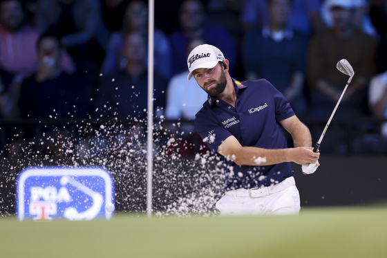 Cameron Young of New York Golf Club plays a shot from a bunker on the fourth hole the TGL match against Atlanta Drive GC at SoFi Center on Jan. 21 in Palm Beach Gardens, Florida. [TGL] 