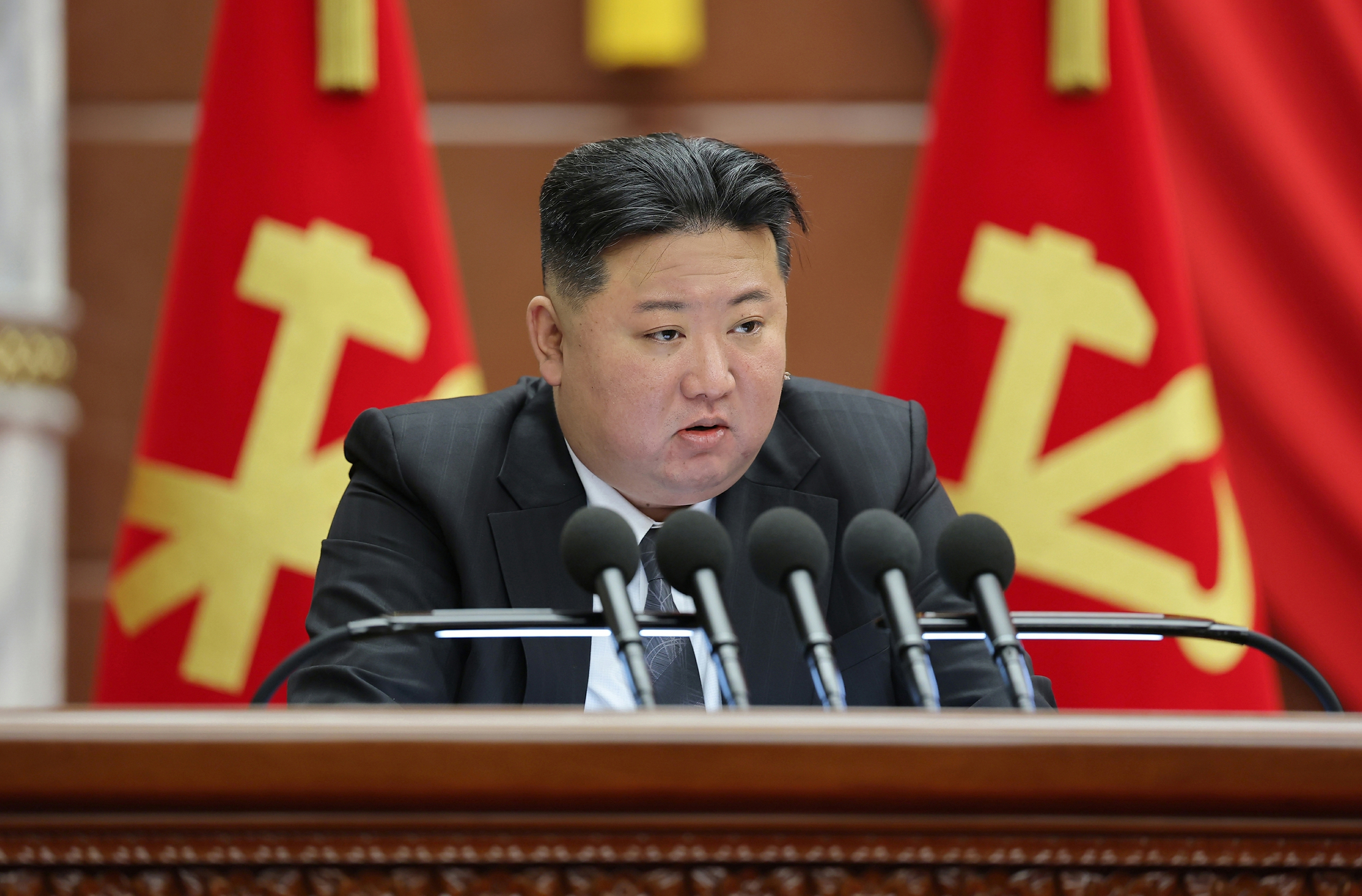 North Korean leader Kim Jong-un speaks at a meeting of the Supreme People's Assembly, which took place from Dec. 23 to 27, in this photo captured from the Korean Central Television. [SCREEN CAPTURE]