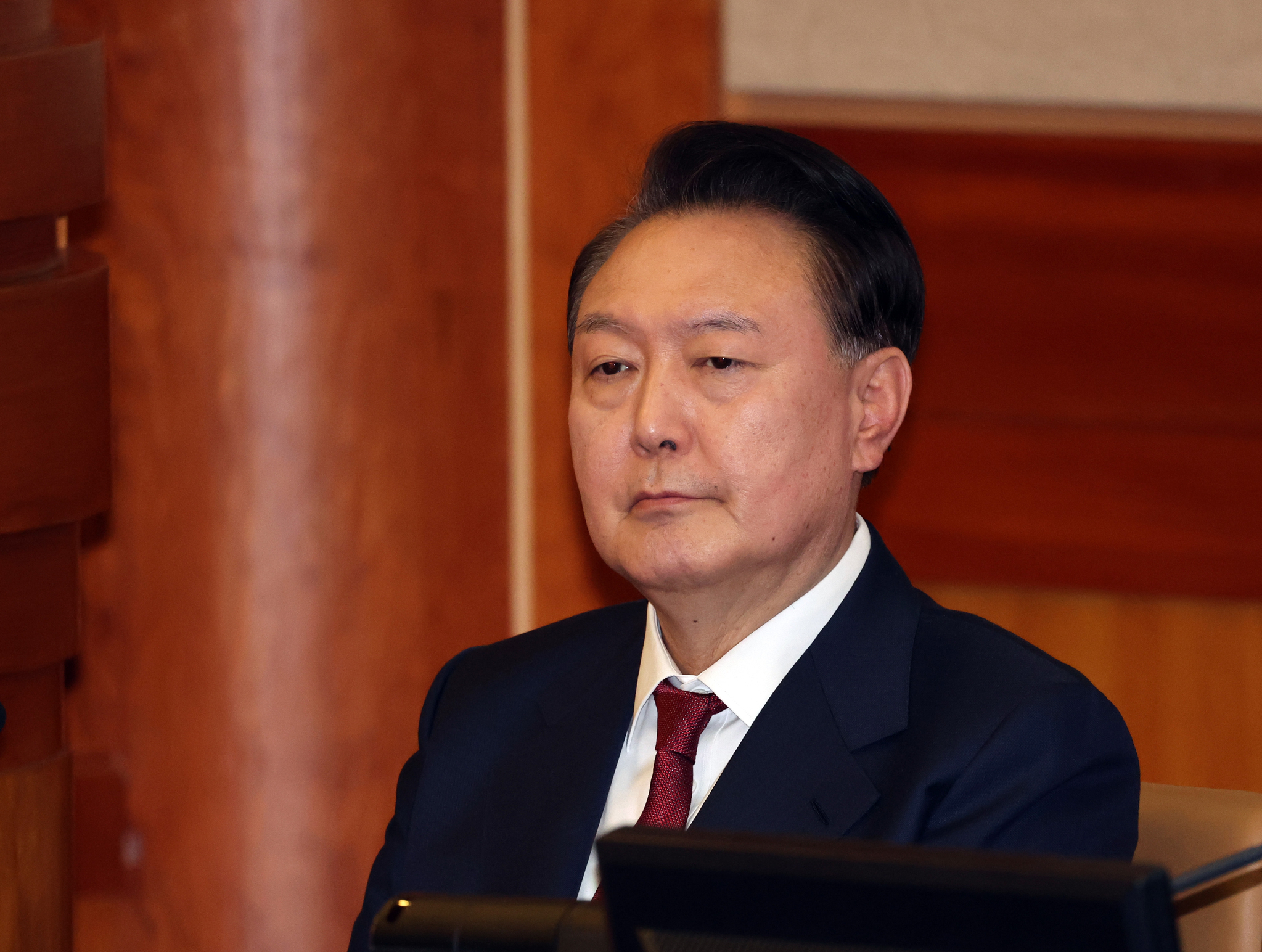 Impeached President Yoon Suk Yeol attends a hearing at the Constitutional Court on Jan. 23. [YONHAP]