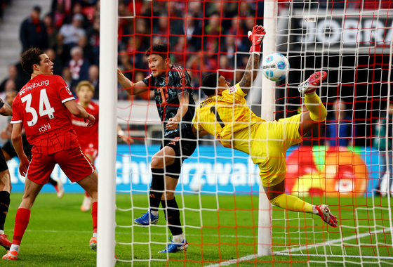 Bayern Munich defender Kim Min-jae, center, scores a goal during the Bundesliga match against Freiburg at Europa-Park Stadion in Germany on Jan. 25. [REUTERS/YONHAP] 