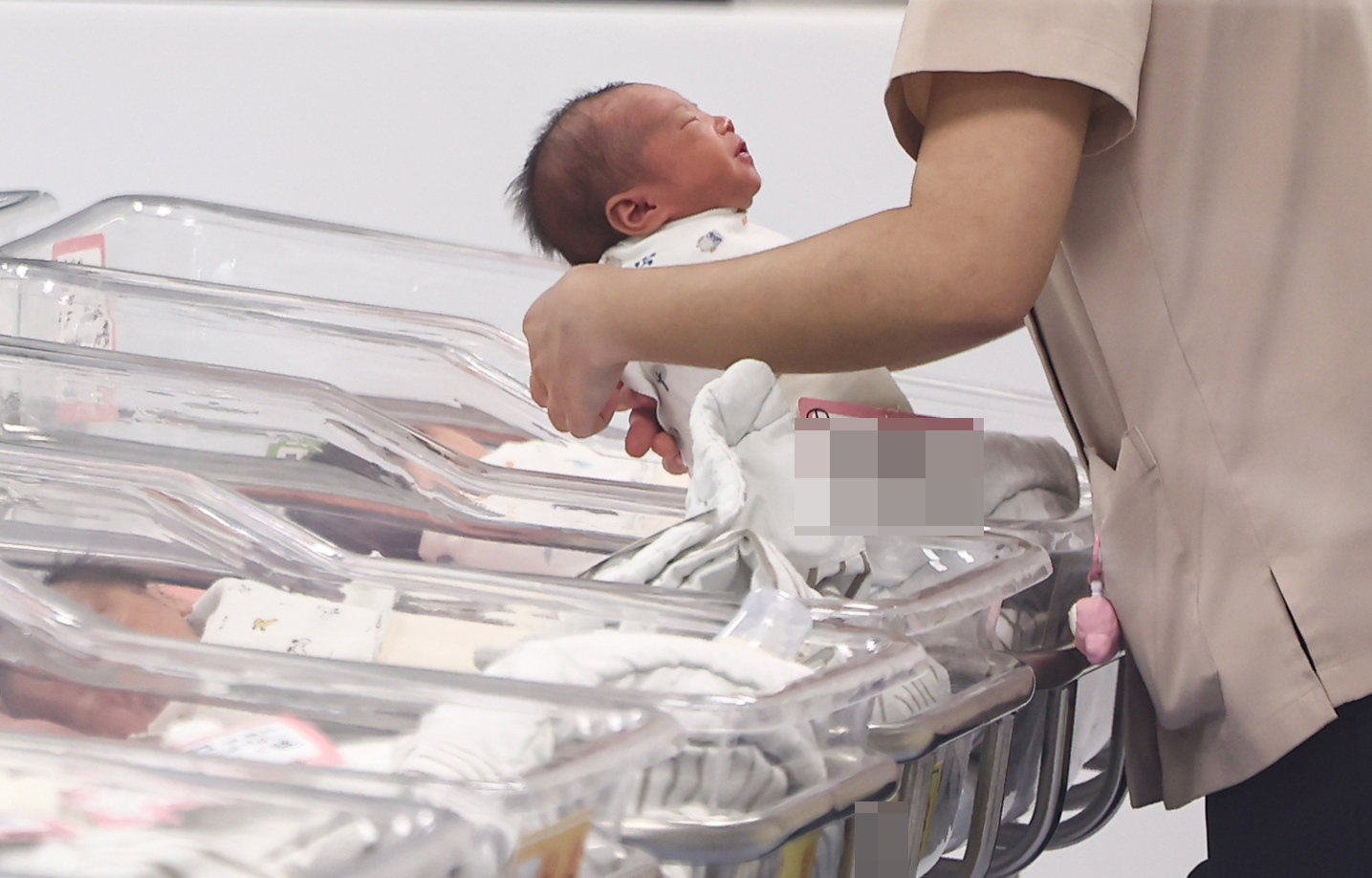 A nurse takes care of an infant at a hospital in Michuhol District, Incheon, on Dec. 26, 2024. [NEWS1] 