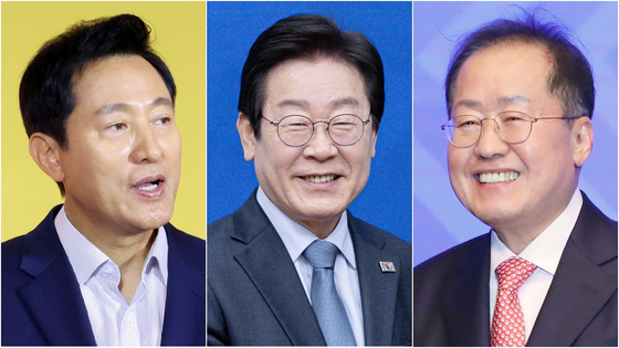 Seoul Mayor Oh Se-hoon, left, Democratic Party leader Lee Jae-myung, center, and Daegu Mayor Hong Joon-pyo [NEWS1]