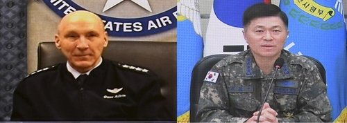 Air Force Chief of Staff Gen. Lee Young-su, right, and his U.S. counterpart, Gen. David W. Allvin, hold video talks on Jan. 31, 2025, in this photo provided by Korea's Air Force. [YONHAP]