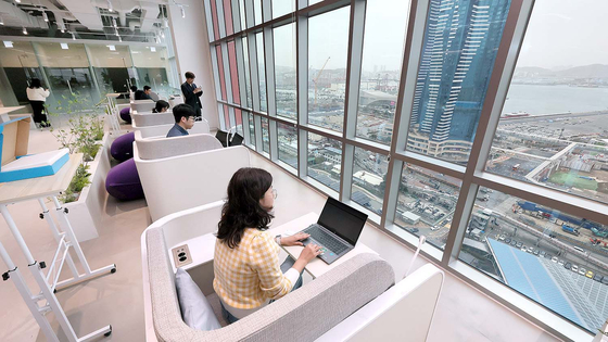 People use a space and facilities designed for so-called workcation in Busan on March 26, 2023. Workcation, an amalgam combining work and vacation, refers to working remotely while on leave. [SONG BONG-GEUN]