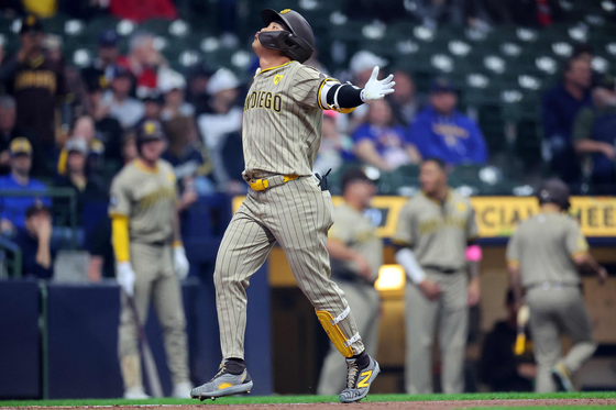 Kim Ha-Seong celebrates a three run home run during the first inning with his team the San Diego Padres at American Family Field on April 16, 2024 in Milwaukee, Wisconsin. [AFP/YONHAP]