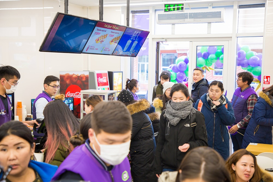 Customers shop for goods at a CU branch in Mongolia. [BGF RETAIL] 