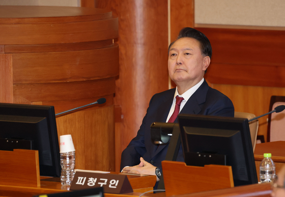President Yoon Suk Yeol attends the fourth hearing of his impeachment trial at the Constitutional Court of Korea in Seoul on Jan. 23 regarding his short-lived imposition of martial law in December. [JOINT PRESS CORPS]