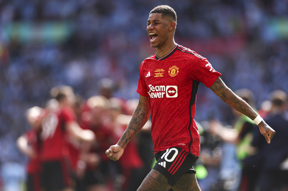 Marcus Rashford celebrates after Manchester United win the FA Cup final against Manchester City at Wembley Stadium in London on May 25, 2024. Rashford moved to Aston Villa on loan on Monday. [AP/YONHAP]