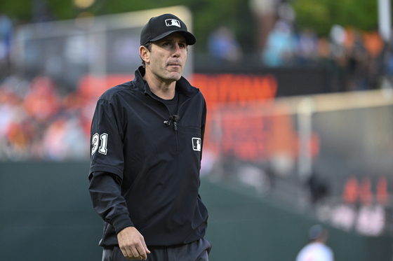 Umpire Pat Hoberg looks on during a baseball game between the Baltimore Orioles and the Los Angeles Angels in Baltimore, Marlyand, May 17, 2023. [AP/YONHAP]