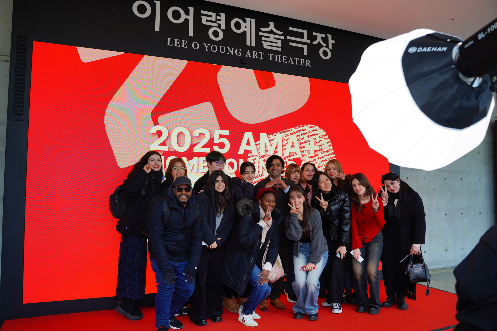 AMA+ scholarship alumni pose for a photo at the homecoming ceremony held Thursday at the Korea National University of Arts' campus in Seongbuk District, northern Seoul, to celebrate the scholarship's 20th anniversary. [KOREA NATIONAL UNIVERSITY OF ARTS]