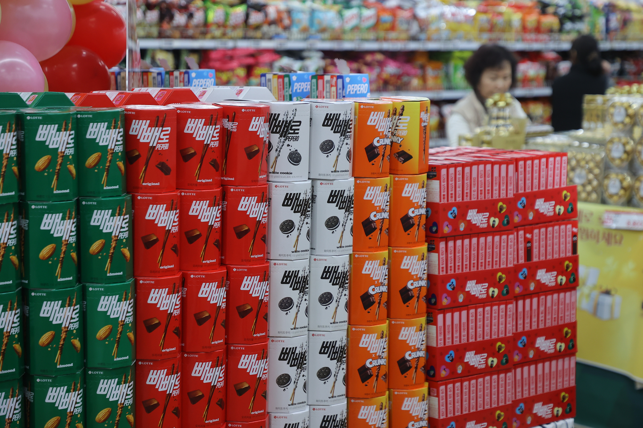Boxes of Pepero are stacked in a market in Seoul on Nov. 10, 2024. [YONHAP] 