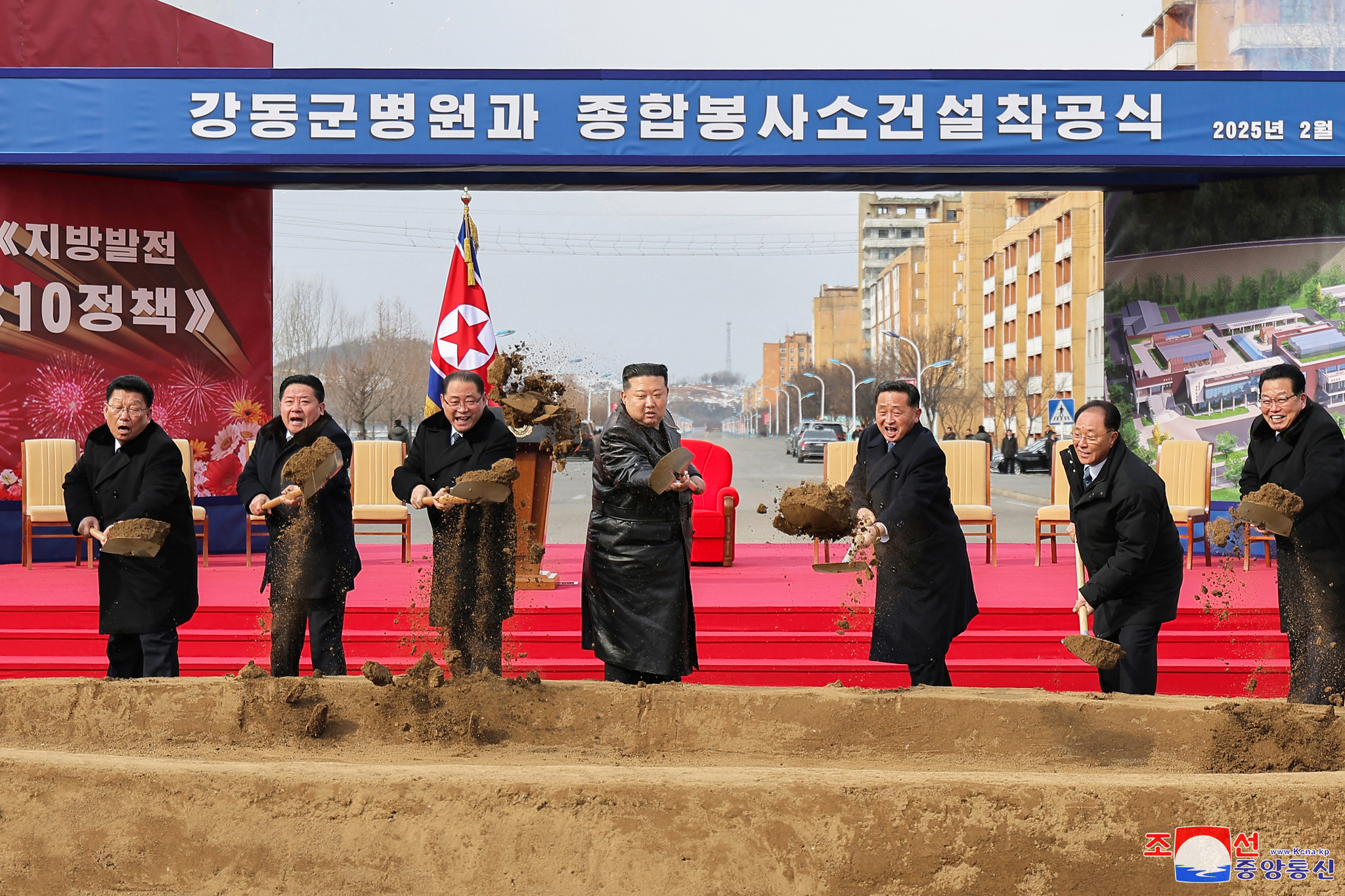 North Korean leader Kim Jong-un, center, attends a groundbreaking ceremony for a regional hospital in Kangdong County in a photo published by the Korean Central News Agency on Feb. 7. [KOREAN CENTRAL NEWS AGENCY] 
