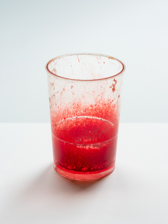 A photograph of a red cup taken by Koo Bohnchang [KOO BOHNCHANG]