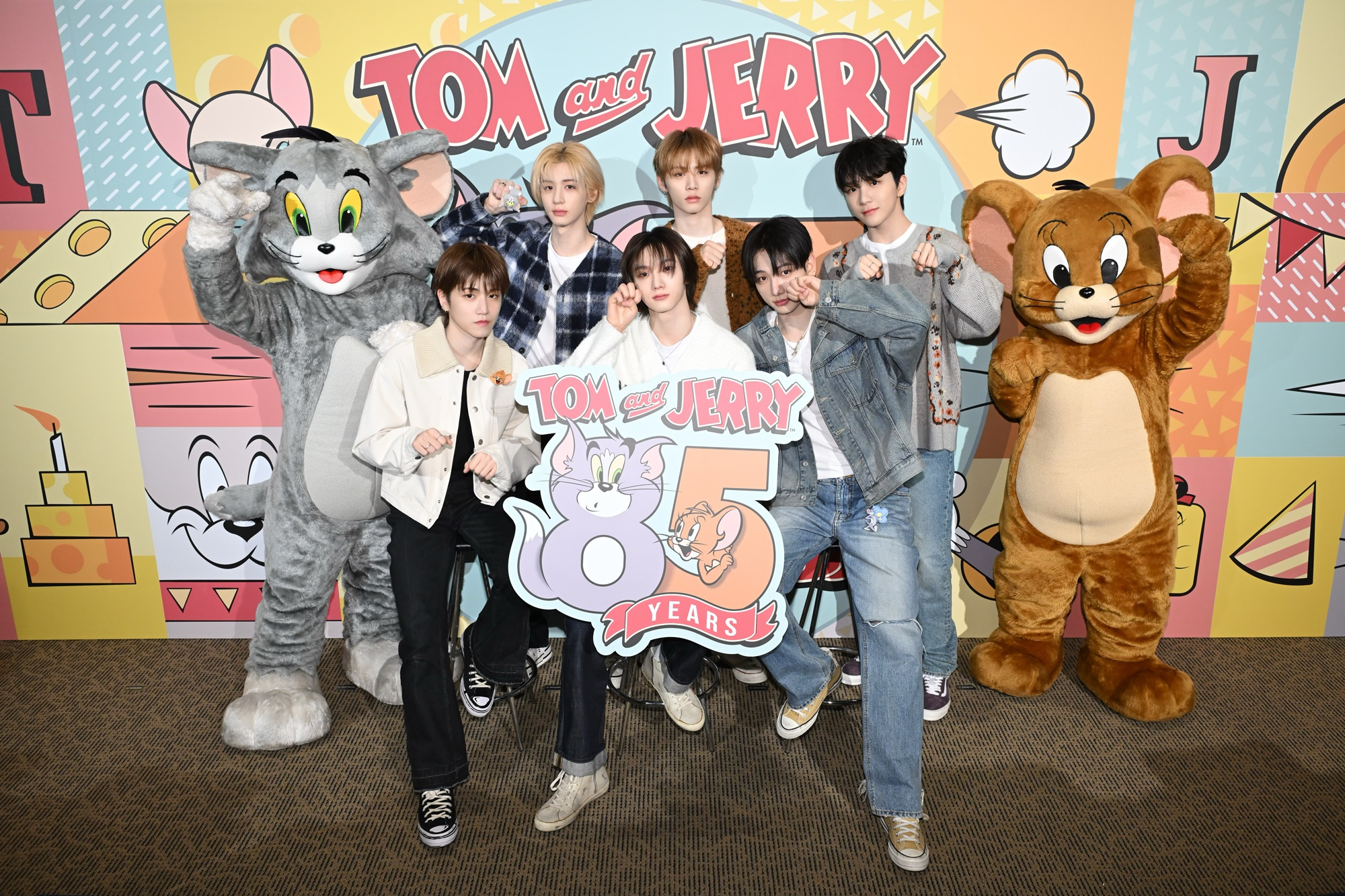 Boy band BoyNextDoor poses for photos at a special event held Monday at Warner Bros. Japan’s headquarters in Tokyo to mark the 85th anniversary of the animation series “Tom and Jerry.” [TURNER ENTERTAINMENT]