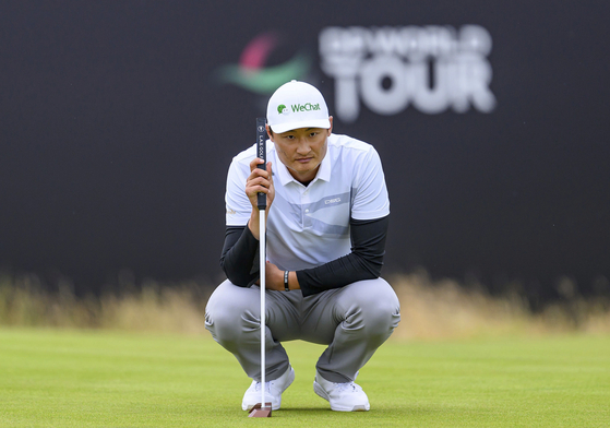Li Haotong looks on the 18th green on day one of the Scottish Open at The Renaissance Club, North Berwick, Scotland, Thursday July 11, 2024. [AP/YONHAP]