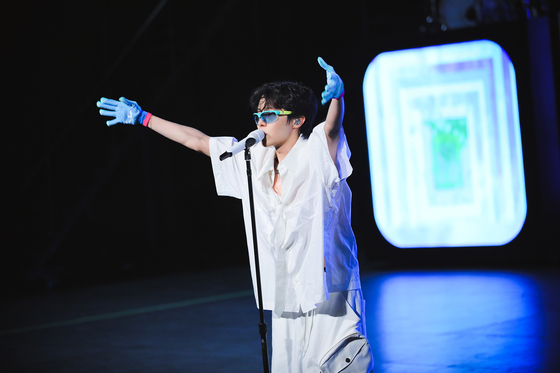 J-Hope sings in Disney+'s documentary ″j-hope IN THE BOX″ (2023). The singer is slated to kick off his world tour ″Hope on the Stage″ on Feb. 28 [DISNEY+] 