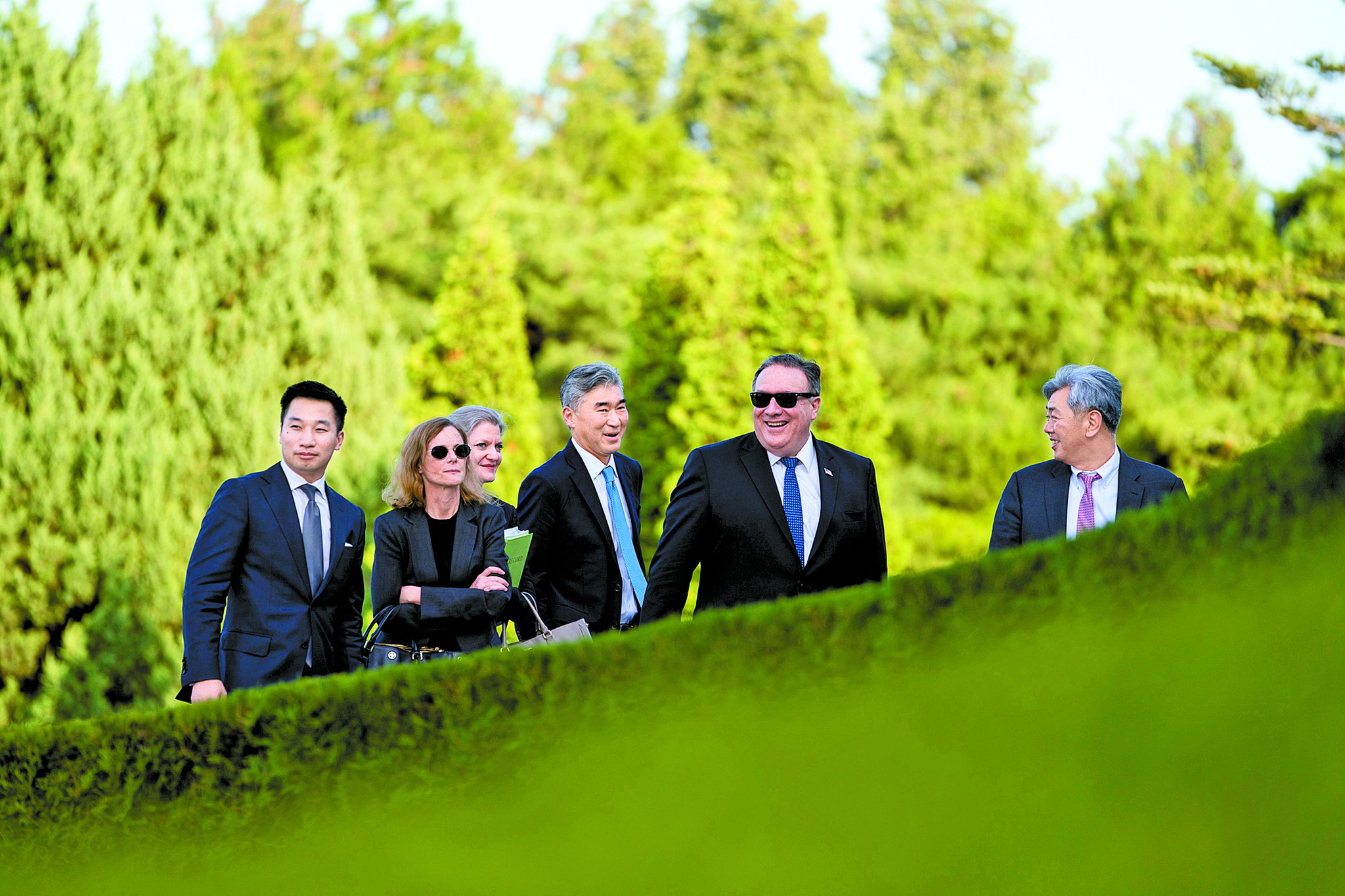  From left, Deputy Assistant Secretary for the Bureau of East Asian and Pacific Affairs Alex Wong, aide Lisa Kenna, NSC Korea Director Allison Hooker, U.S. Ambassador to the Philippines Sung Kim, Secretary of State Mike Pompeo, and Andrew Kim, the head of the CIA's Korea Mission Center, walk back into the Park Hwa Guest House after speaking together following a meeting with Kim Yong Chol, a North Korean senior ruling party official and former intelligence chief, in Pyongyang, North Korea, Friday, July 6, 2018. [POOL/REUTERS/YONHAP]