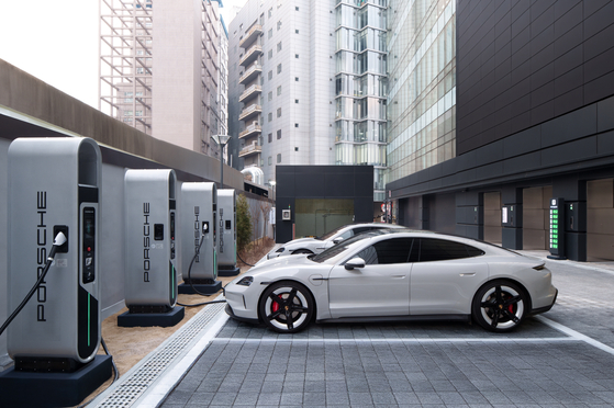 Porsches are being charged at its new 12-story service center in Seongsu-dong, eastern Seoul. [PORSCHE KOREA]