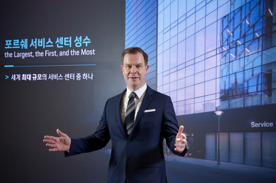 Porsche Korea CEO Mathias Busse speaks during a media event at a new service center in Seongsu-dong, eastern Seoul, on Feb. 12. [PORSCHE KOREA]